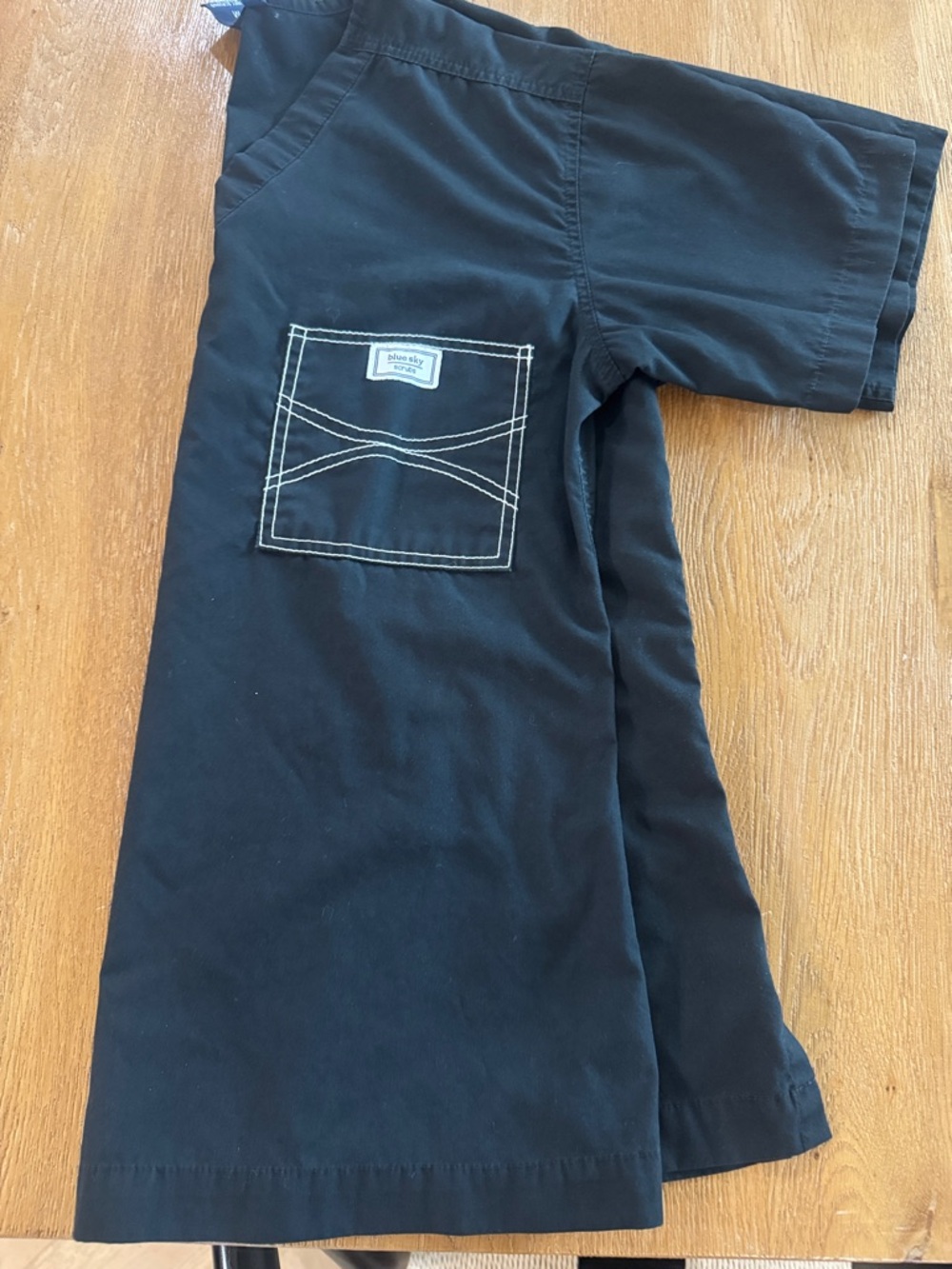 Blue Sky Black Scrub Top with White Contrast Stitching Size Medium